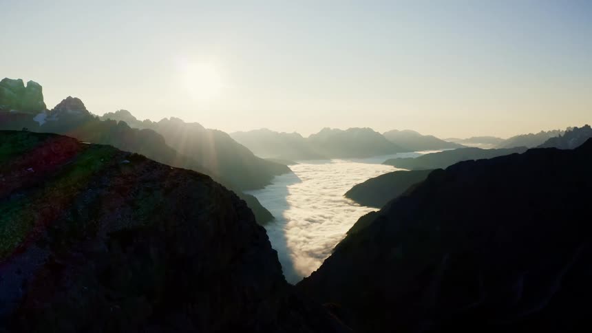 A blanket of snow fills the valleys in a canyon