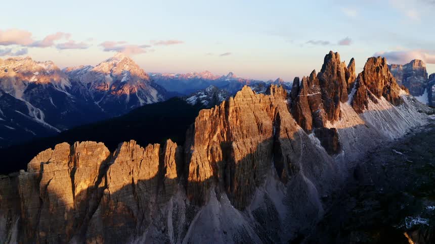 Mountain range with peaks high in the sky