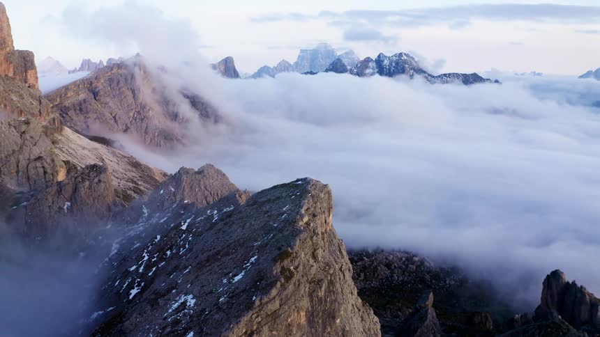 Mountain peaks high above the clouds