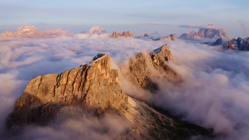 Mountain range with peaks high above the clouds