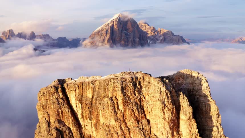 Aerial view of mountain range with thick clouds