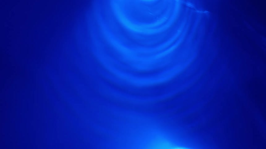 A ripple growing in water