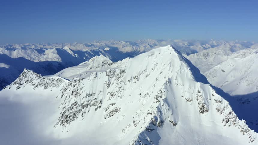 Snow covered mountains on a clear day