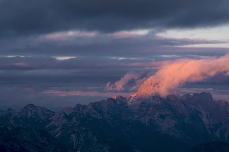 Time lapse of clouds moving over a mountain range