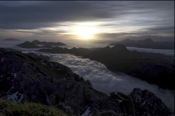 Time lapse of clouds moving over a mountain range