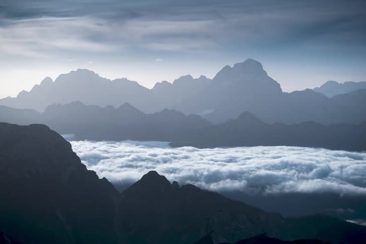 Time lapse of clouds moving over a mountain range