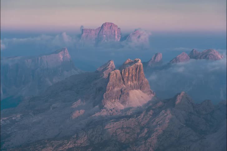 A mountain range in the clouds