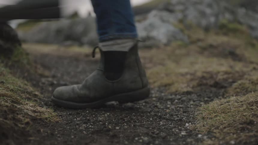 A person walks outdoors