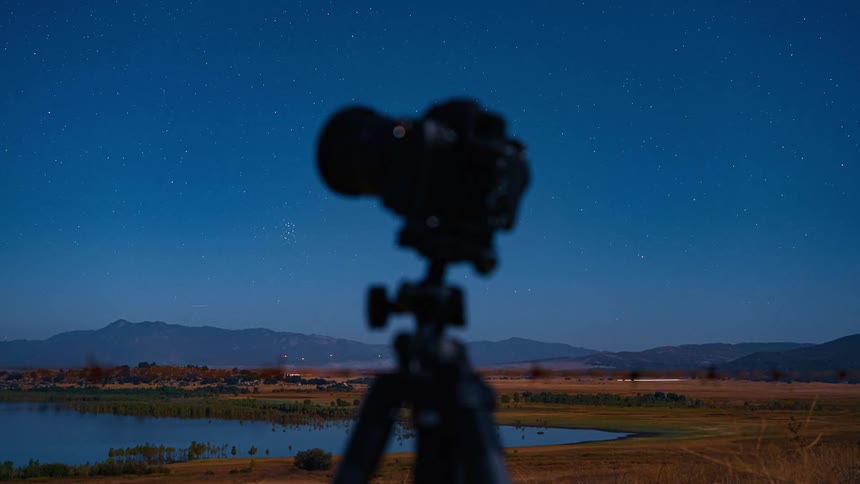 Time lapse of a camera shooting the sky next to a highway