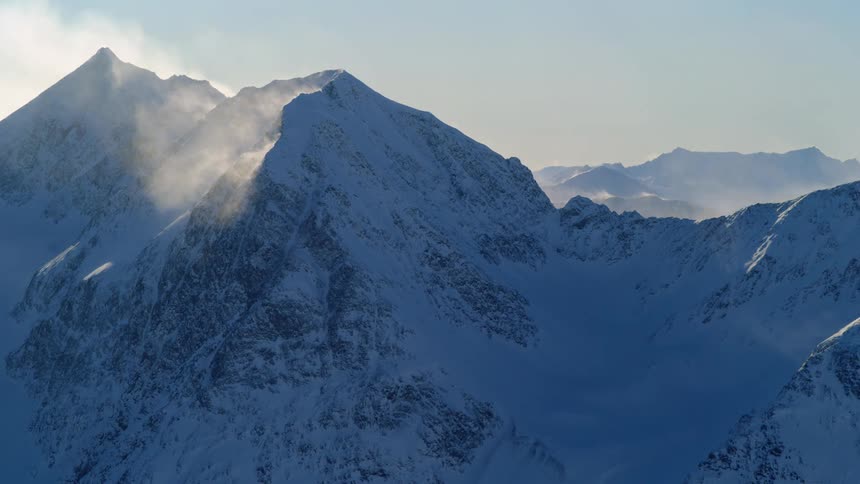 View of high snow capped mountains