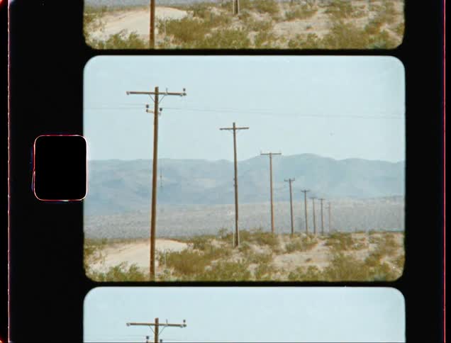 The desert is lined with power lines