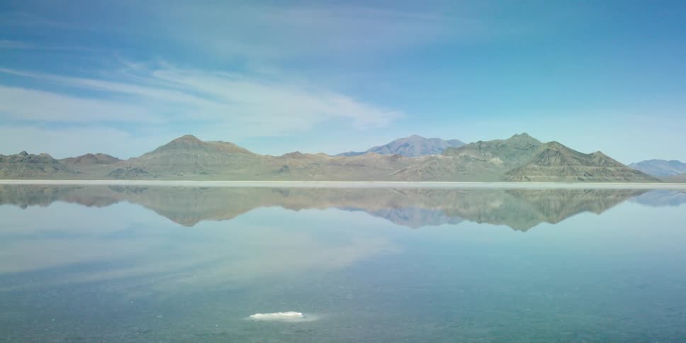 Mountains and their reflection off of a still lake