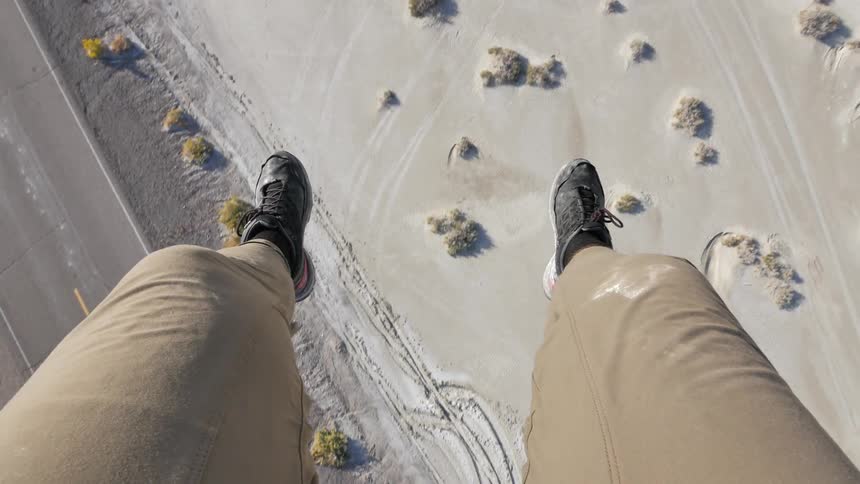 View of someone's feet as they float in the air