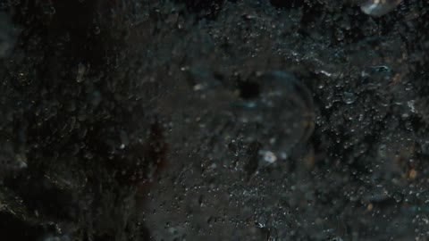 Liquid moving by a force with bubbles everywhere