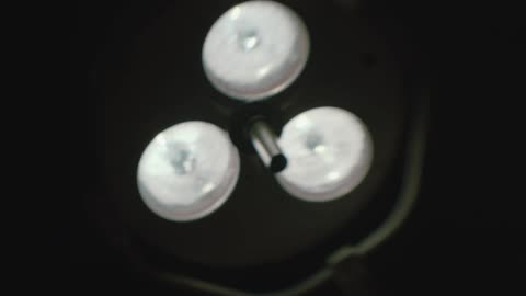 Three bright lights shining in the dark