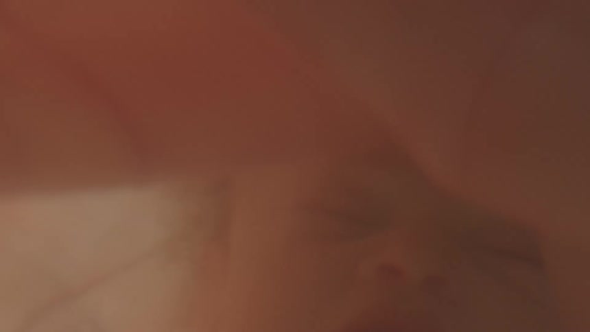 Unborn babys face in the womb