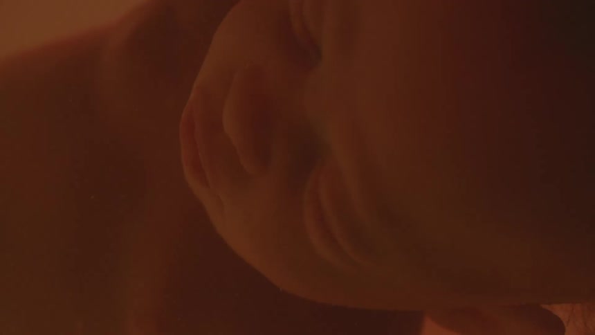 A fetus floating in utero