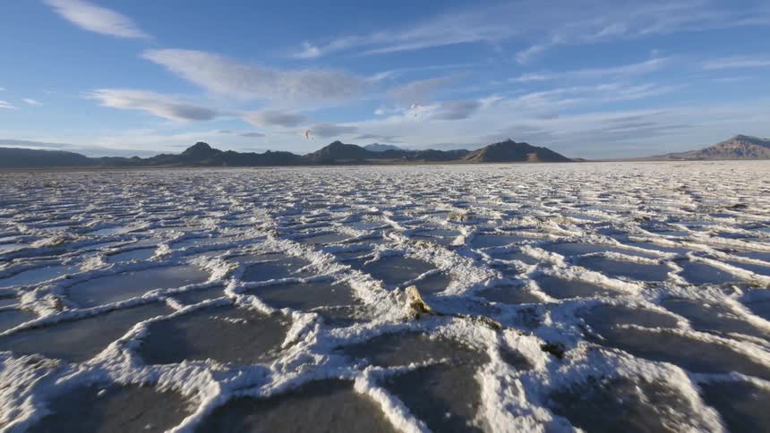 A watery area on a nearly cloudless day