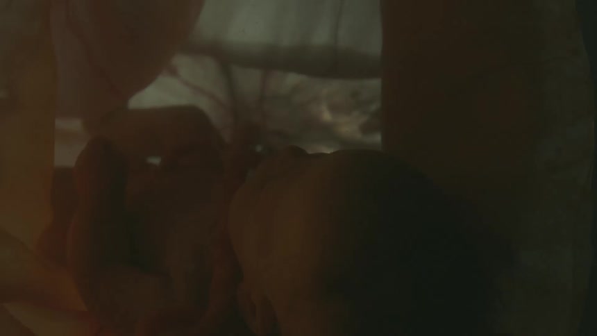 Unborn human baby floatin ginside the placenta in the womb