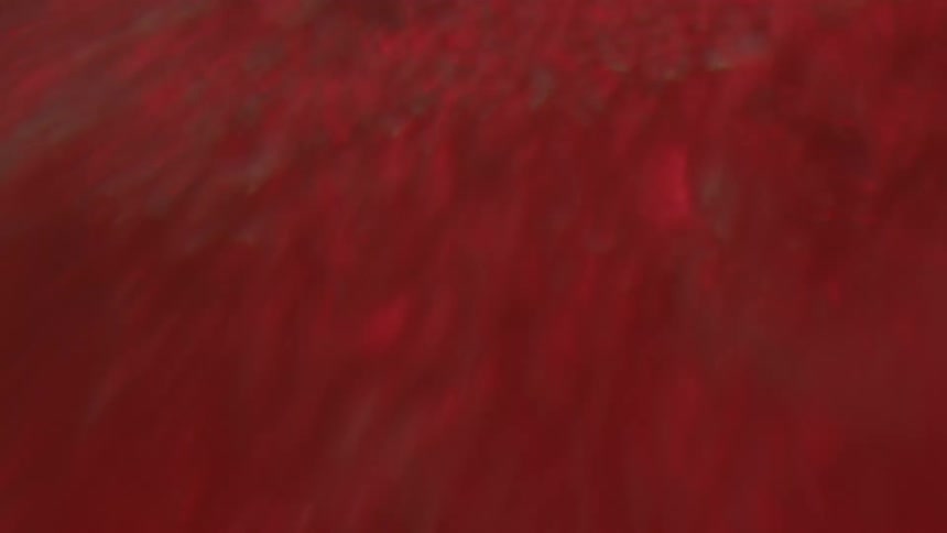 Bubbling red liquid
