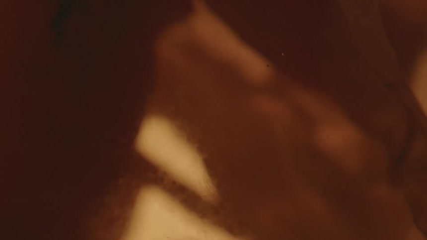 Unborn baby with umbilical cord in the womb