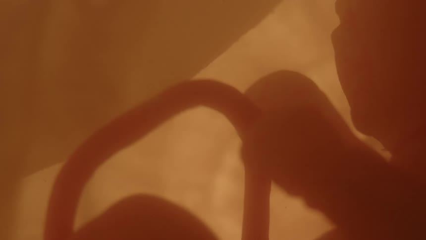 Bright light shines as unborn baby floats in gestational sack