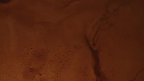Light reflection over the cracked sand surface on a floor