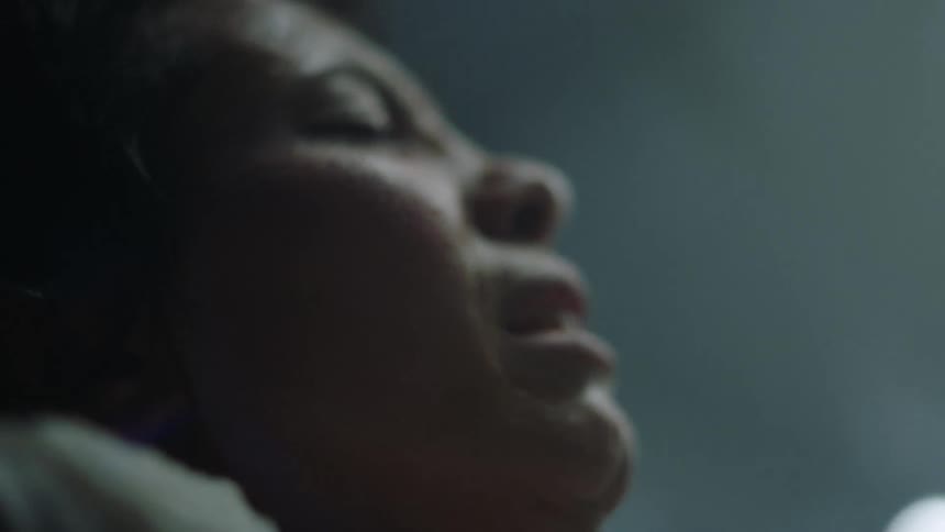 Pregnant woman in labour gives birth to a child