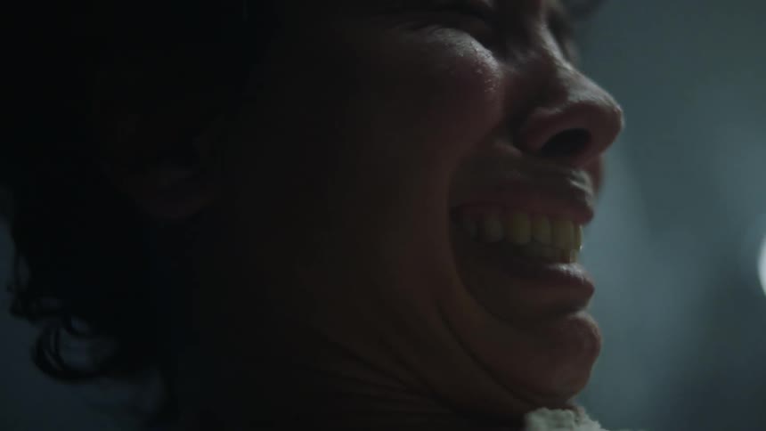 A woman in pain while giving birth
