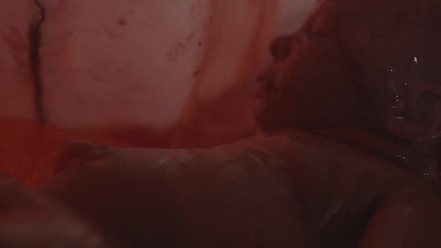 A fetus inside an emptying amniotic sac