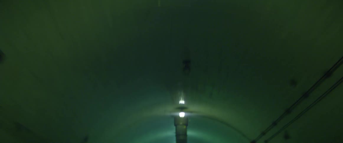 A tunnel as a vehicle drives through it