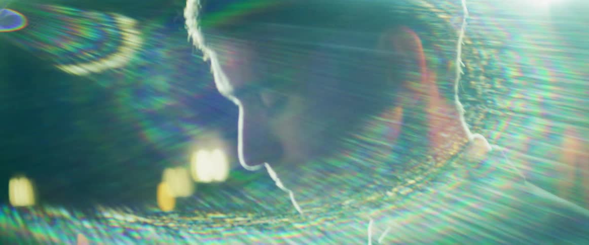 A man under strobing lights
