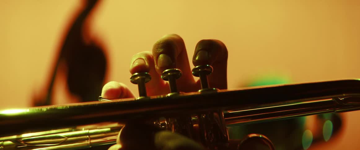 A man is playing a musical instrument