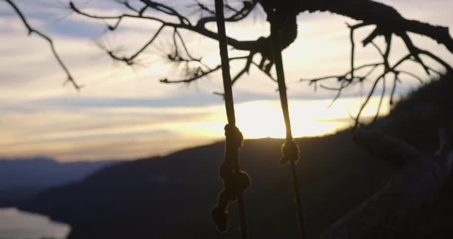 The sun is setting in the horizon