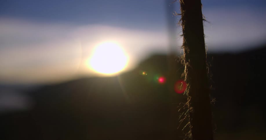 The sun is setting in the horizon