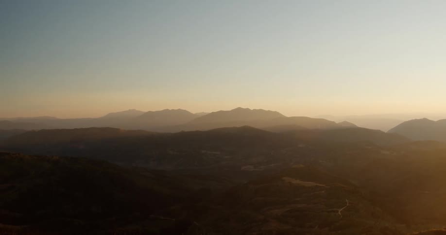 The sun is setting in the horizon