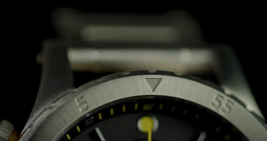 Close up of a wristwatch with steel watch case