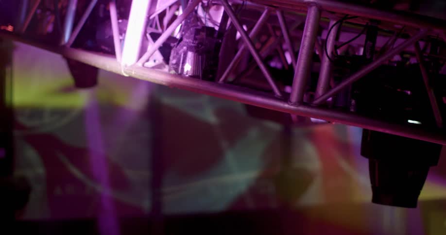 Colorful concert lights flashing around at an event