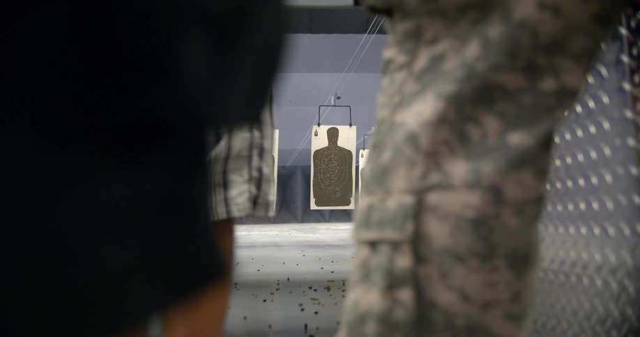 People shooting at targets at a shooting range
