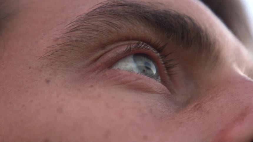 Close up of a mans eyes outside