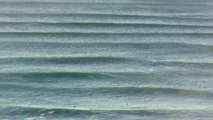 Aerial view of an ocean is displayed