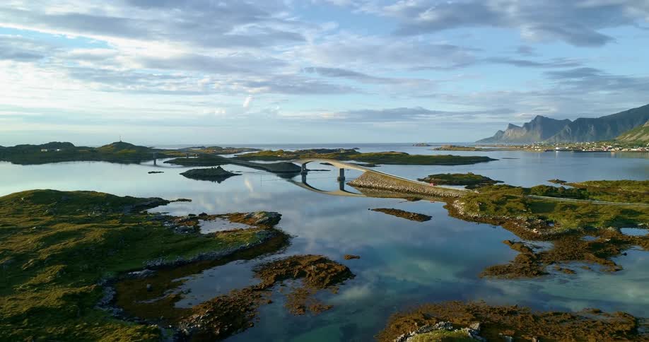 Lake with small plots of land where a bridge connects one side to another
