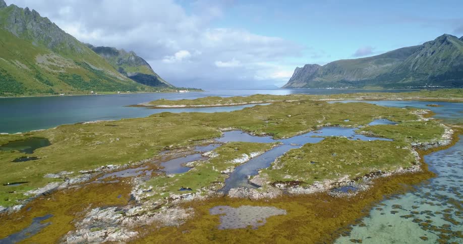 A landscape view of a river between mountain ranges