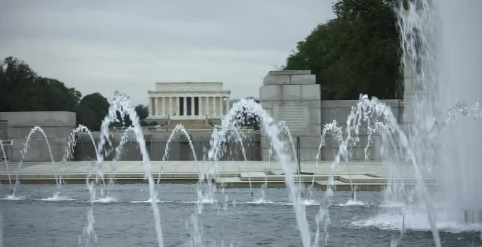 A water fountain in front of a building