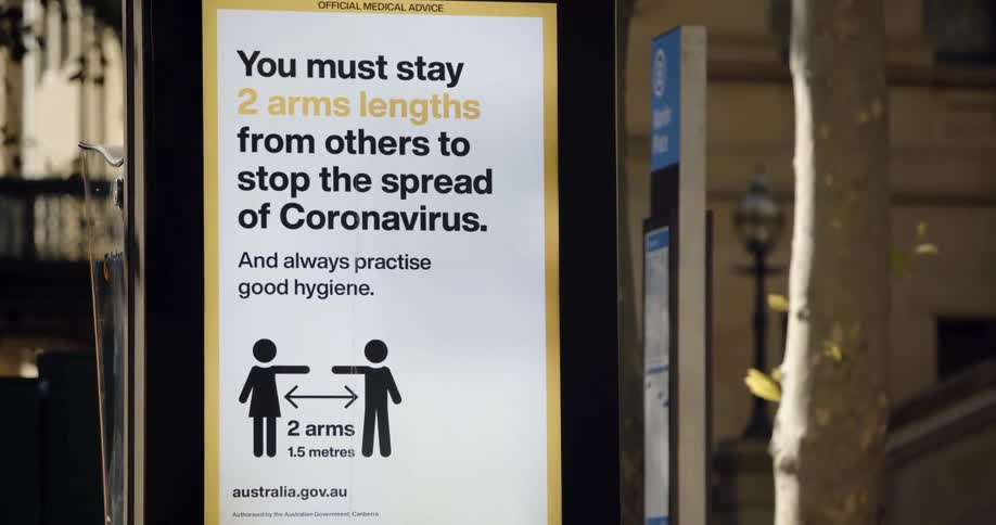 Posted covid 19 social distancing sign outdoors in australia