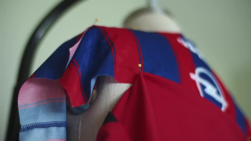 Unfinished jersey hanging on a fabric mannequin