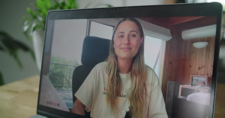 A person on a video call on a tablet