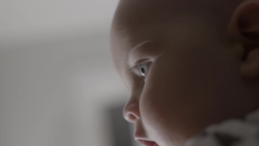Close up of a baby looking at something