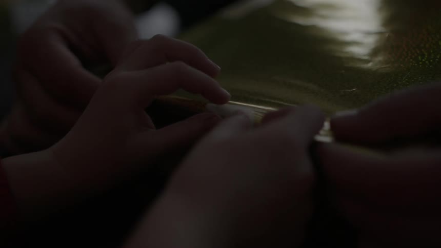 A person fidgets with paper