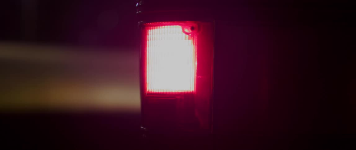 A lit up tail light on a vehicle